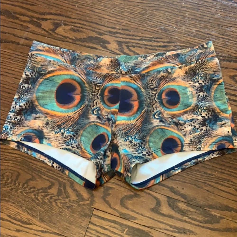 Onzie peacock feather print shorts